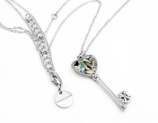 Christian Lacroix silver butterfly key pendant style X46185W